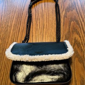 DKNY over the shoulder purse, leather with faux wool. So classy! Perfect Bundle!